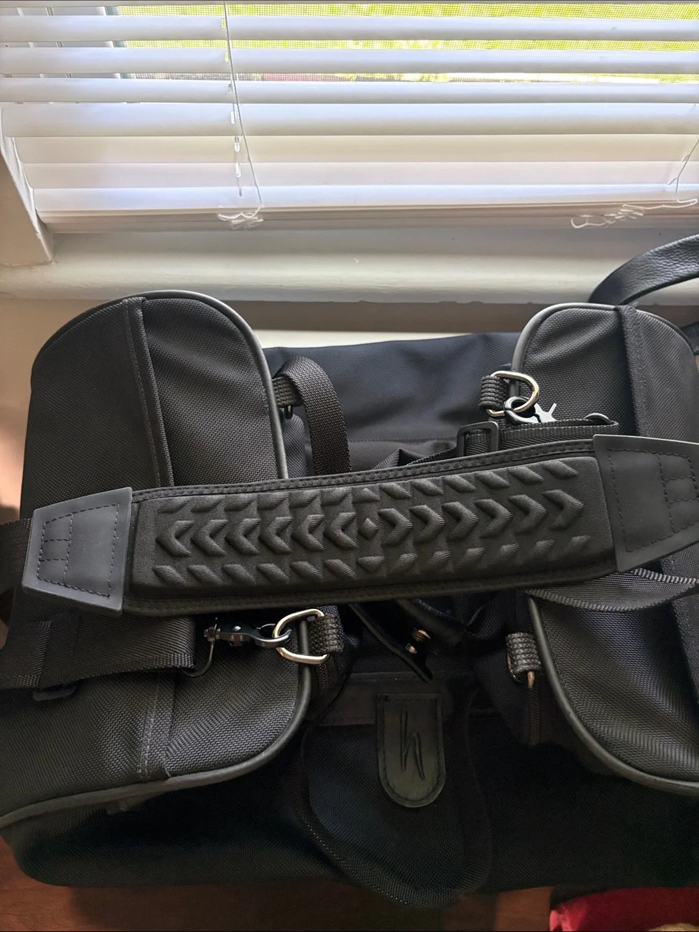 Hartmann zip around nylon and leather duffle style bag.